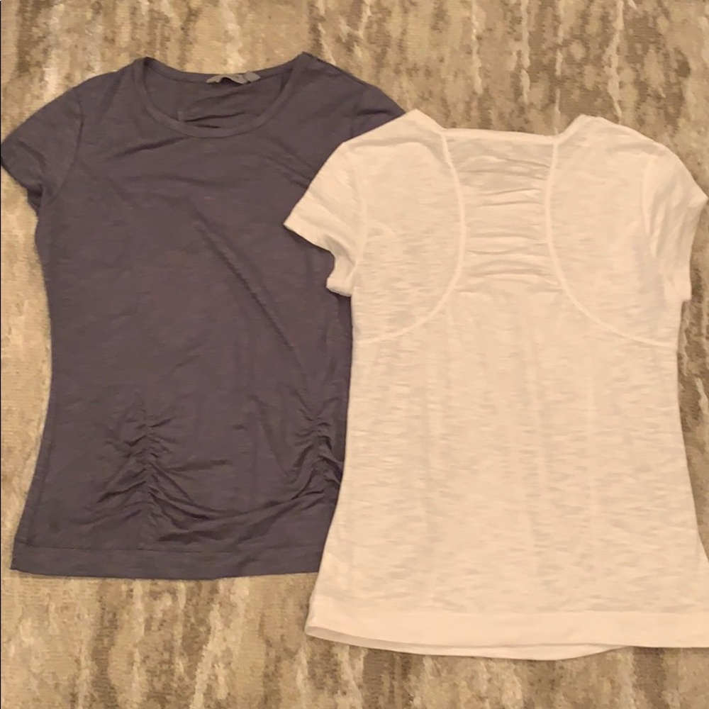 Two Athleta short sleeve tops